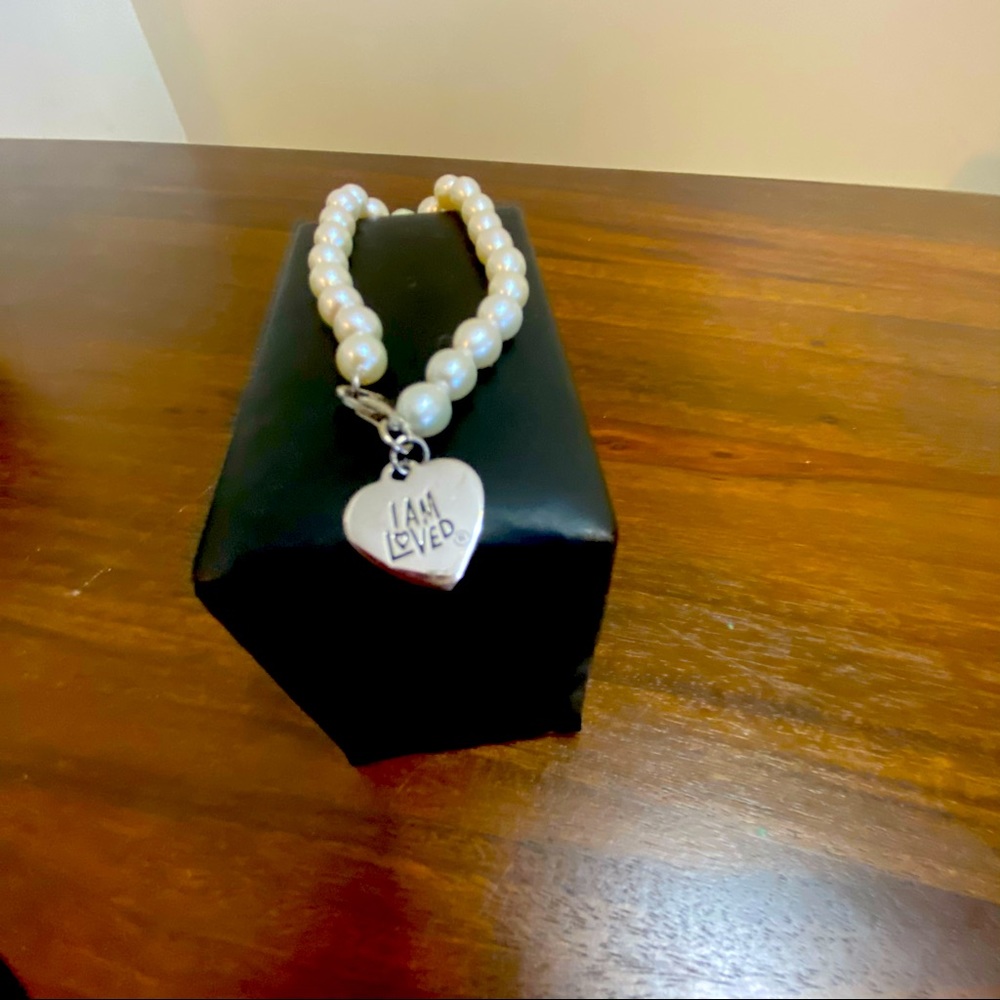 Faux pearl bracelet.